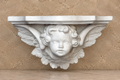 Angel Face Cast Stone Bracket