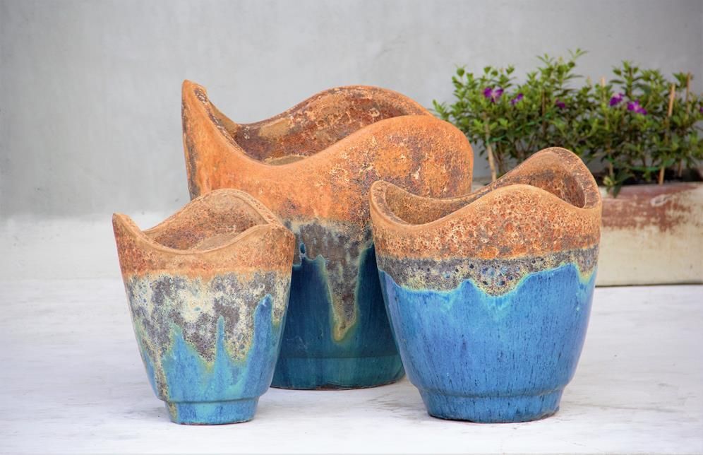 NEW_PORT_CERAMIC_PLANTERS - Cast Stone International 